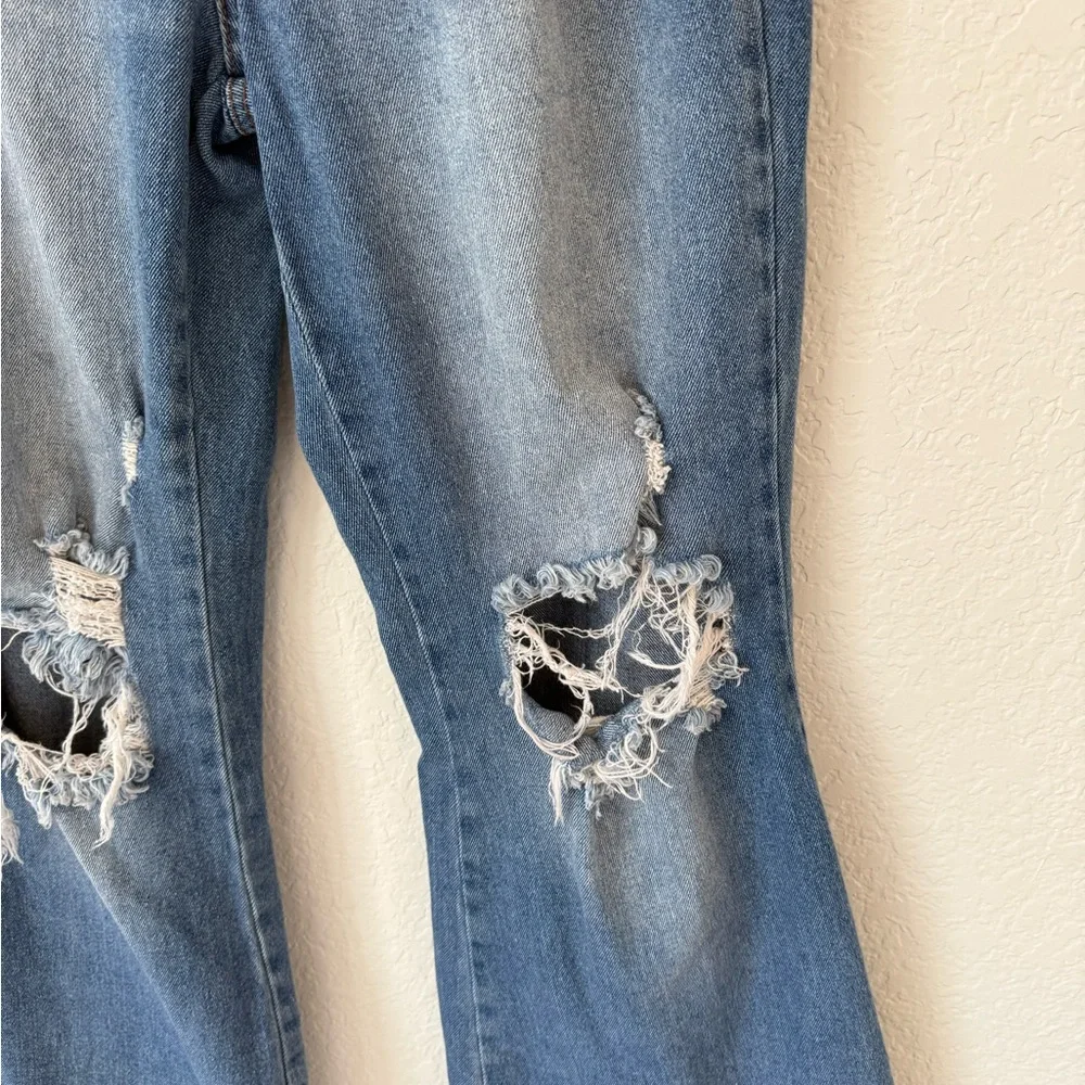 Almost Famous women's Light Blue Distressed flared Jeans